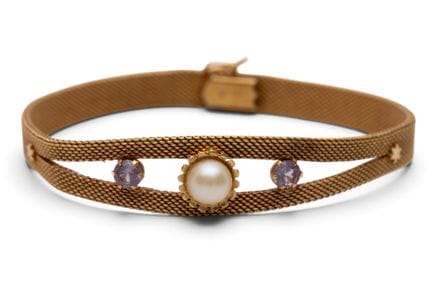Un bracelet tissé du milieu du siècle, serti de pi