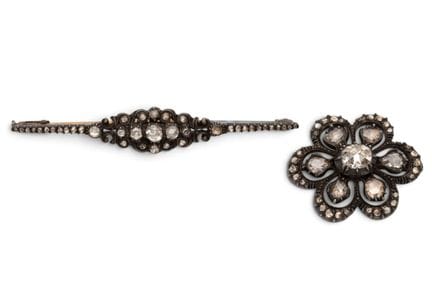 Deux broches en argent et or ornées de diamants ta