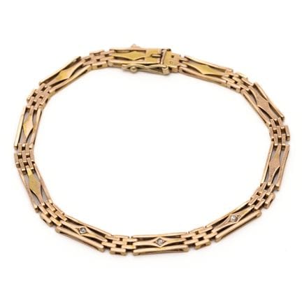 Bracelet à chaîne en or rouge au design géométriqu