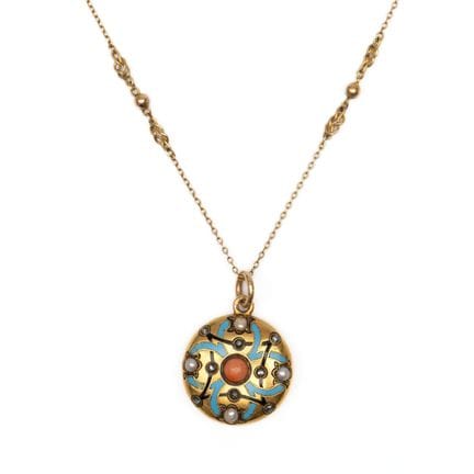 A late 19th-century round locket. The front featur