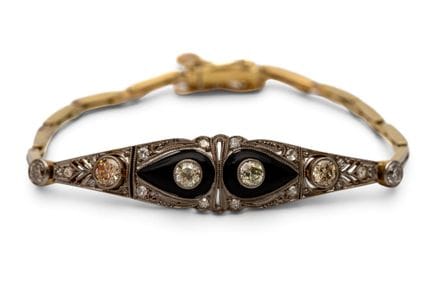 Bracelet Art déco en diamants et onyx. La partie a