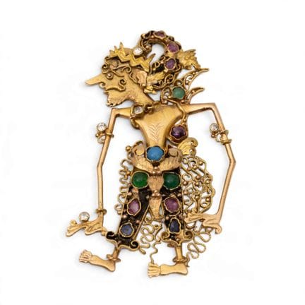 Broche et pendentif Wayang indonésiens sertis de p
