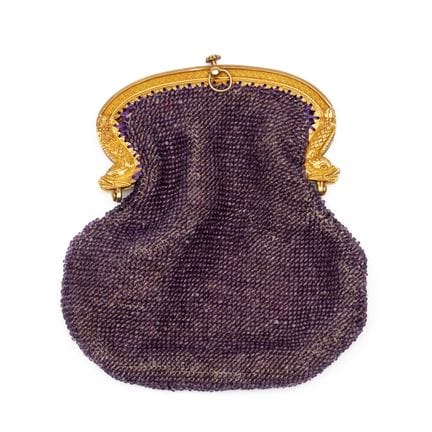 A 19th-century gold coin purse decorated with dolp