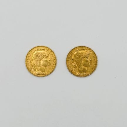 法国
一套两枚20法郎金币（玛丽安娜与公鸡图案）
铸造年份分别为1911年和1914年
存于已拆封的