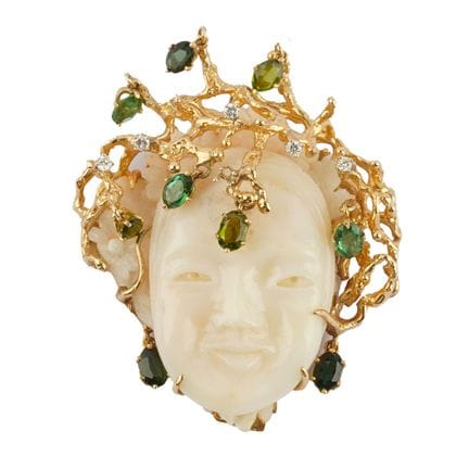 ORO DE 14 K / 14K GOLD
Broche-colgante con un dise
