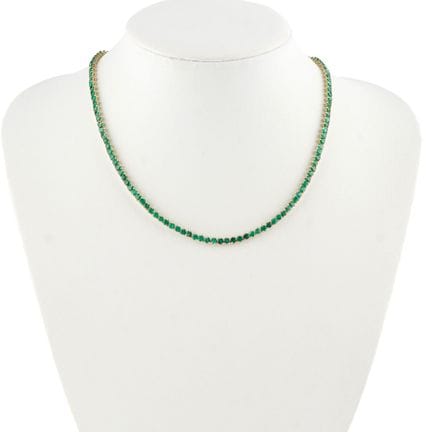 ORO DE 14 K, ESMERALDAS
Collar tipo «río» de oro a