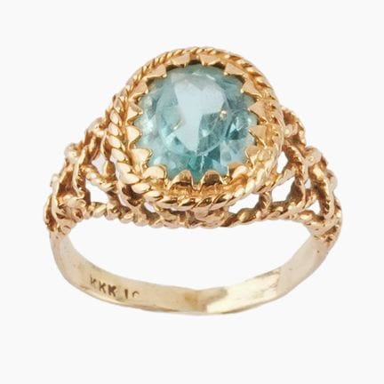 10K GOLD
10K yellow gold ring set with a natural S