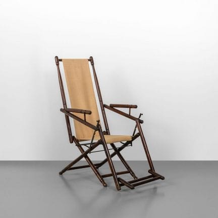 A RECLINING ARMCHAIR  from the 1920s.
Aniline-stai