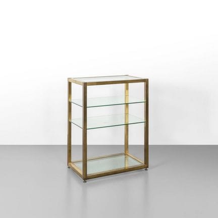UN' ETAGERE  anni '70. 
Ottone  cristallo.
Cm 86 (