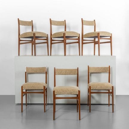 SIX CHAIRS  from the 1960s.
Teak wood  with padded