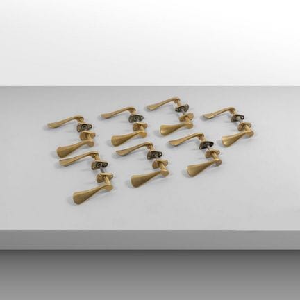 SEVEN PAIRS OF DOORKNOBs  from the 1950s. 
Brass.
