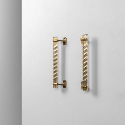 A PAIR OF DOOR HANDLES from the 1950s. 
Brass and 
