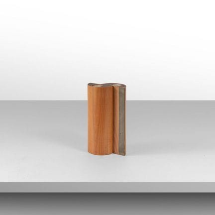 DRAWERS  1960s.
A flower vase.
Walnut wood  brass.