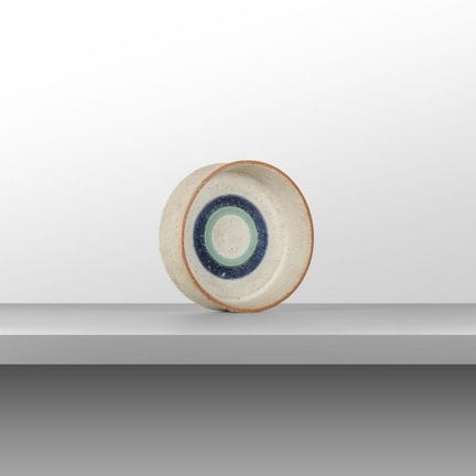 布鲁诺·甘博内（BRUNO GAMBONE） 20世纪60年代。
一件餐桌中心装饰品。
釉面石质陶器