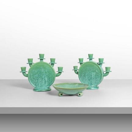 GUIDO ANDLOVIZ  S.C.I.  1954.
Due candelabri e un 