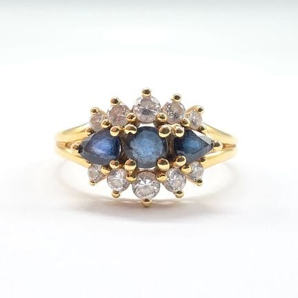 Bague en or jaune 14 K (585°°) sertie de pierres i