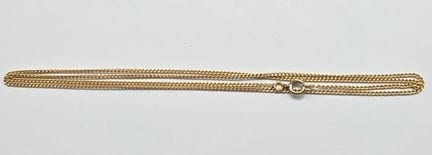 18K yellow gold (750°°) chain with curb links, met