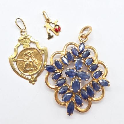 Pendentif en or jaune 18 K (750°°) accidenté - Ang