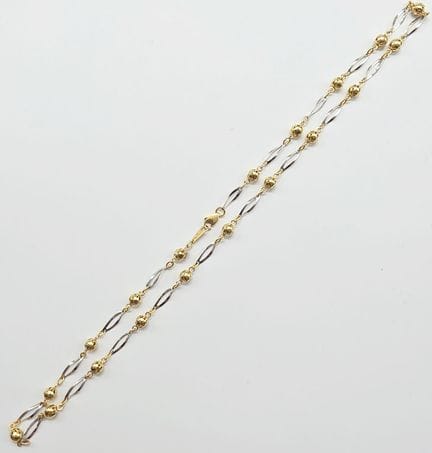 Two-tone 18K yellow gold (750°°) choker, weight 9.