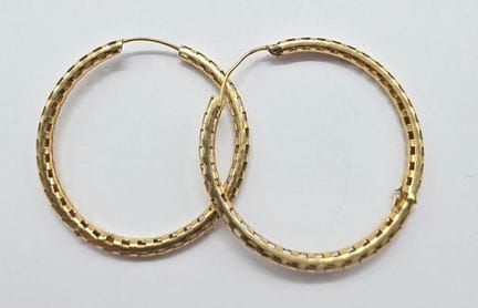 Pair of 18K yellow gold (750°°) hoop earrings, tot