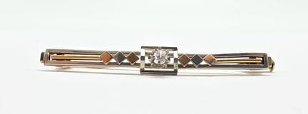 Brosche aus 18 K (750°°) Gelb- und Weißgold im Art