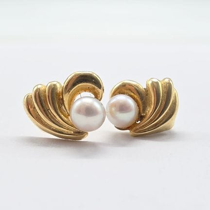 Pair of 18K yellow gold (750°°) earrings set with 