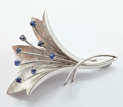 Blumenbrosche aus 18 K Weißgold (750°°) mit Adler-
