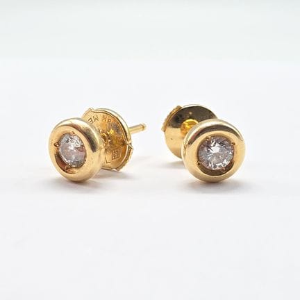 Paire de puces d'oreilles en or jaune 18 K (750°°)