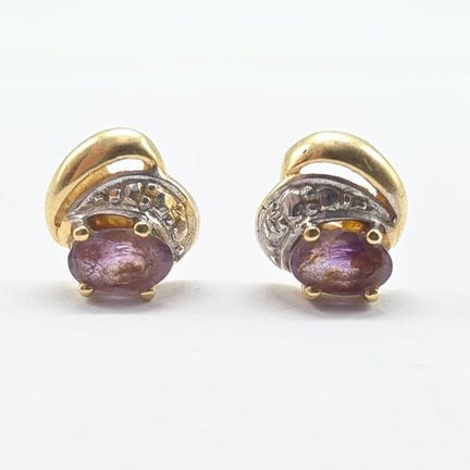 Pair of 18K (750°°) yellow and white gold earrings