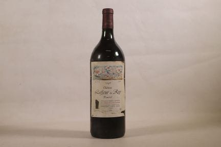 波尔多——1瓶大瓶装波美侯拉弗勒·杜·罗伊酒庄1986年份葡萄酒。液面低于瓶塞2.5厘米。瓶塞污渍较