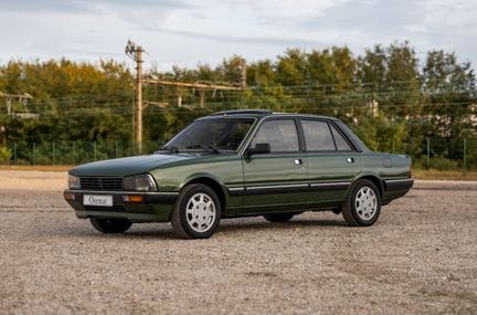 1987年标致505（曾为吉斯卡尔·德斯坦所有）
底盘号 VF3551A9603080127 
法国