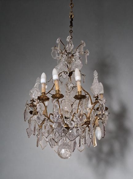 LUSTRE CAGE en bronze doré à douze bras de lumière