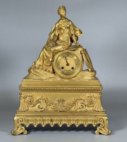 PENDULE dite "à la Sapho" en bronze doré et ciselé