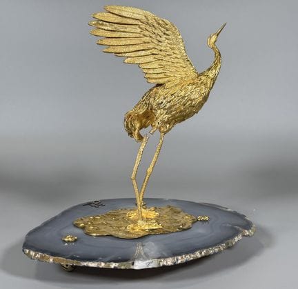 SCULPTURE en vermeil 925° figurant un héron sur un