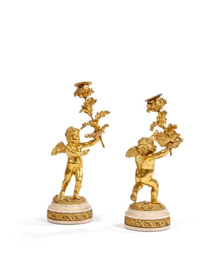 COPPIA DI TORCE CON AMANTI 
In bronzo cesellato e 