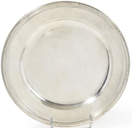Circular PLATE, the rim decorated with a floral fr