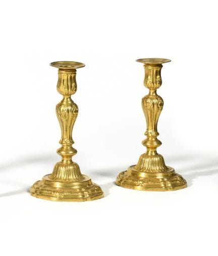 PAIR OF CANDLESTICKS in gilded bronze, decorated w