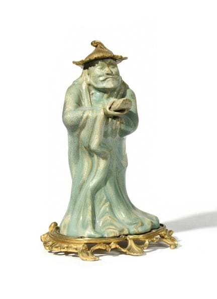 CINA
Figura in gres smaltato raffigurante un saggi