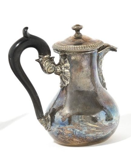 SMALL SILVER PITCHER in the shape of a baluster wi
