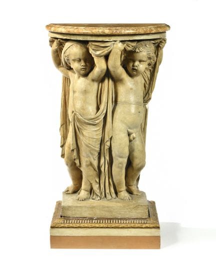 CONSOLE CON PUTTI DRAPPATI 
A forma di mezzaluna, 