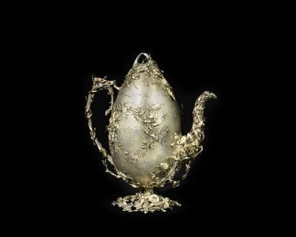 EUGÈNE MICHAUT
Silver coffee pot, repoussé and cha