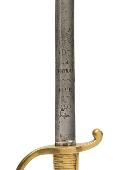 SABRE D'INFANTERIE DIT BRIQUET.
Monture en bronze.