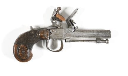 PISTOLET À COFFRE À SILEX.
Canon à pans poinçonné 