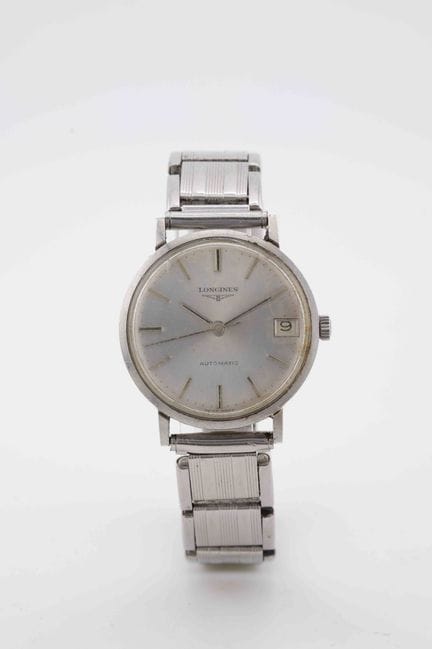 LONGINES
Vers : 1970. 
Boîtier : rond en acier, lu