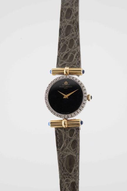 BAUME  MERCIER
Montre de dame
Réf : 523833
Vers : 