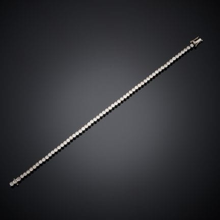 Bracelet rivière en or gris 750 millièmes, serti c