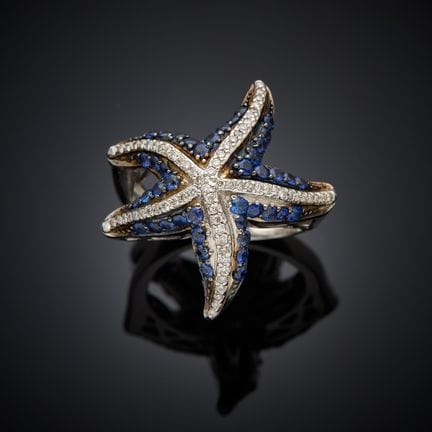 Bague en or gris 750 millièmes, figurant une étoil