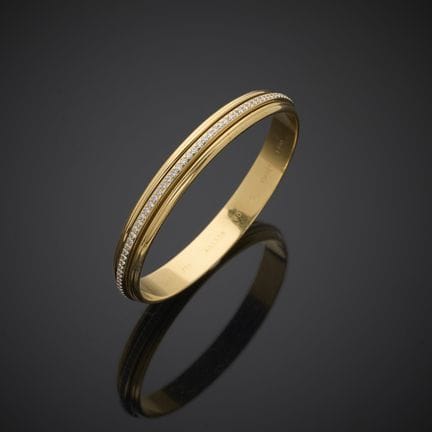 PIAGET "Possession".
Bracelet jonc en or jaune 750