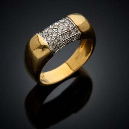 Bague en or jaune 750 millièmes, sertie en son cen