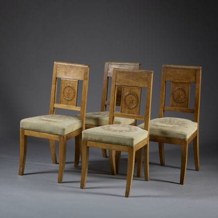 Set of four chairs made of fruitwood, with a bande